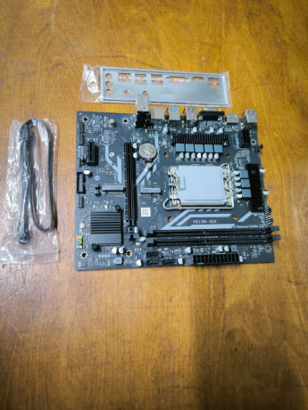 angxun-h610m-4d4-rev-11-intel-h610-lga1700-intel-ozu-2xddr4-dimm-do-32gb-s-3xsata-iii-6-gbi-big-0